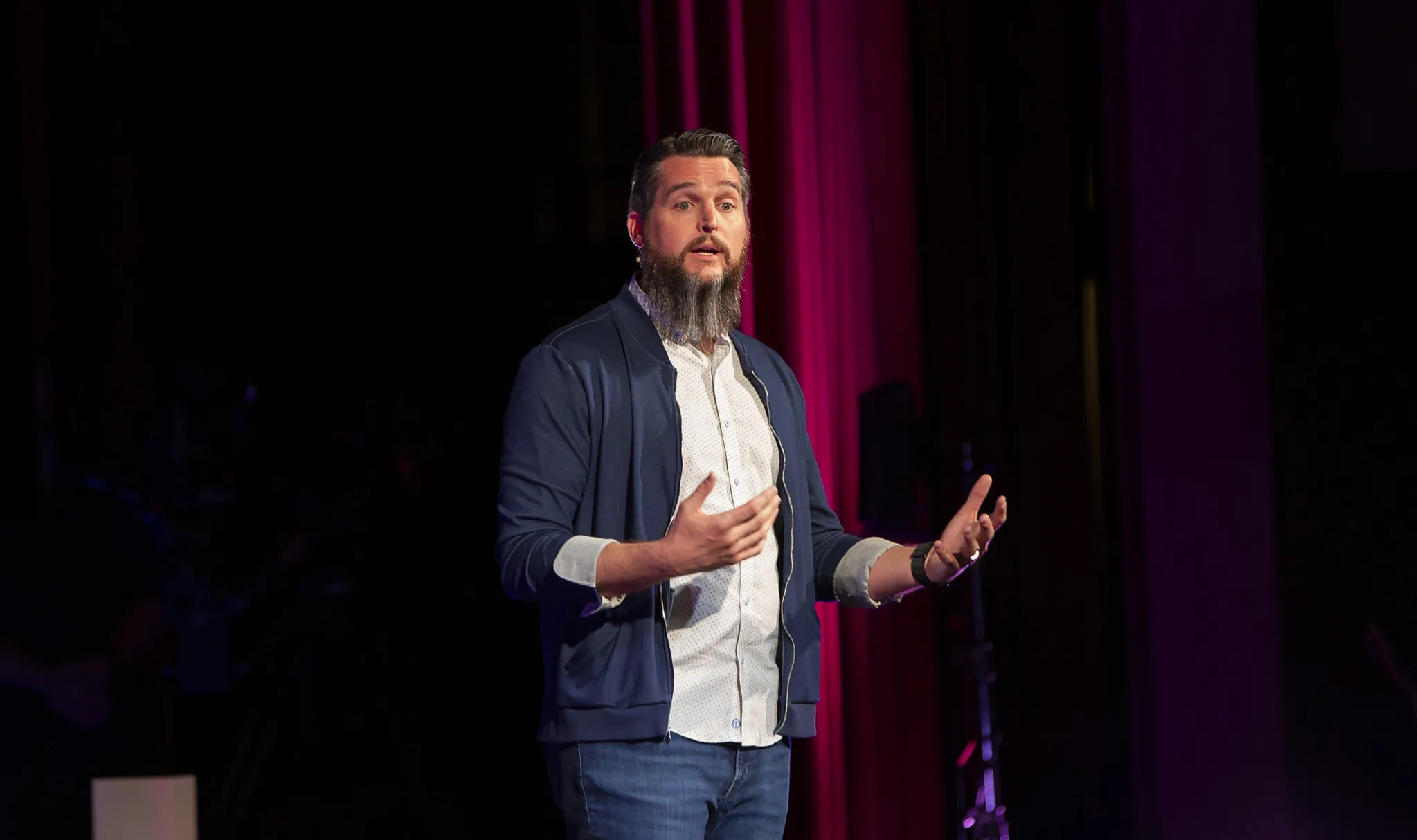 Photo of Erik speaking at TEDxSavannah in 2025